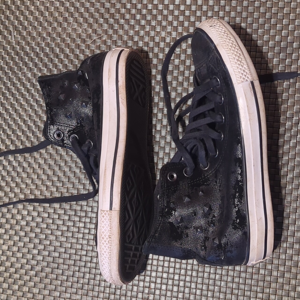 Studded, distressed high top chucks